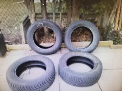 Set of 4 snow tires ( not on rims) 245/60R18 T105 Studdable DOT 2514