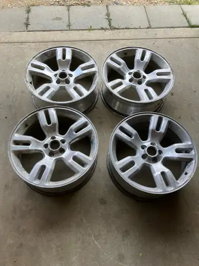 Set of four alloy rims. These rims need to be refurbished. Would be great candidates for powder coat...