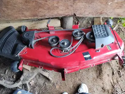 54" Riding lawn mower deck (New) Fits Craftsman, Husquvarna and Poulsen. Belts and blades included....