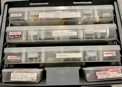 Explore this collection of Meccano parts, perfect for hobbyists and builders. This diverse assortmen...