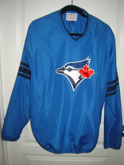 Authentic MLB Toronto Blue Jays waterproof pullover size L, never worn. Beamsville