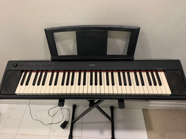 Yamaha keyboard piano Piaggero NP-11 on stand | Pianos & Keyboards
