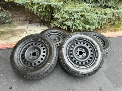 Michelin X-Ice snow SUV 225/65 R17. 5 bolt 5x114.3 or 4.5” CB 56.1. Used 2 seasons. Off Subaru Outba...