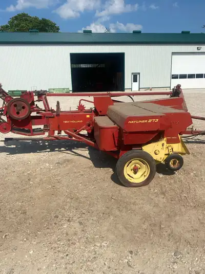 New Holland 273 square baler with 54A thrower. Super sweep pickup, long tongue, always shedded. Work...