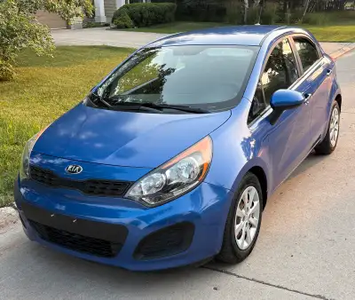 2014 Kia Rio LX hatchback Only 87,000 KMs Fresh safety July 9th 2025 9950$ No GST private sale (firm...