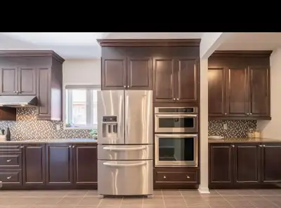 Full maple kitchen with appliances and counter, View more