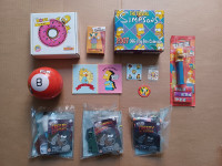 Simpsons collectibles lot with toys, pez, CD and more
