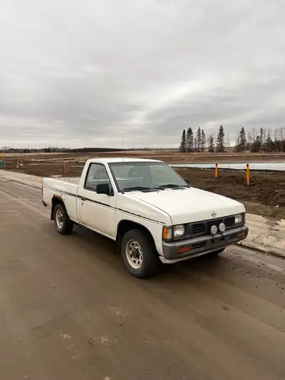 1993 Nissan Hardbody Single Cab Shortbox Reliable little truck that runs and drives good. 4 cylinder...