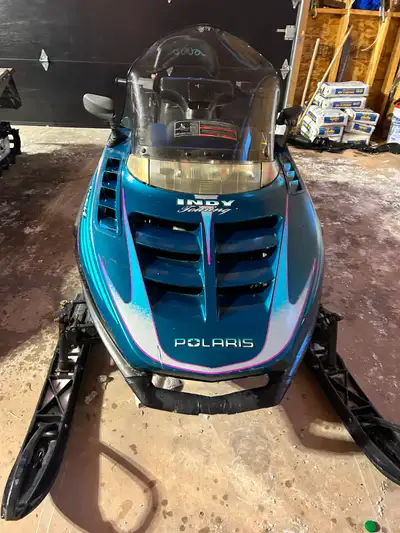 1997 Polaris Indy trail touring Good condition. Great for camp,kids,and ice fishing machine. 488 eng...