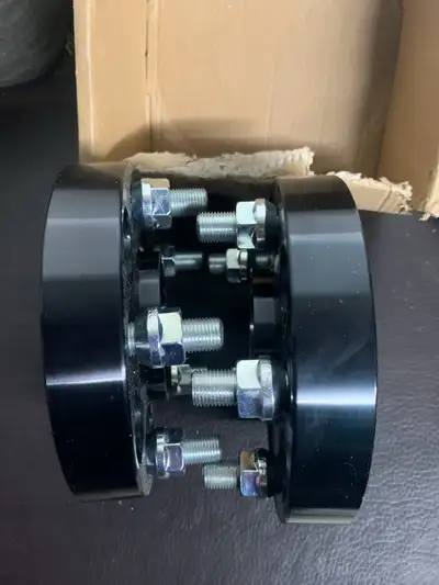 Set of 2 wheel spacers 5x4.5/5x114.3 bolt pattern Thread is m12x2 Bore: 70.5mm 1 inch each Asking $6...