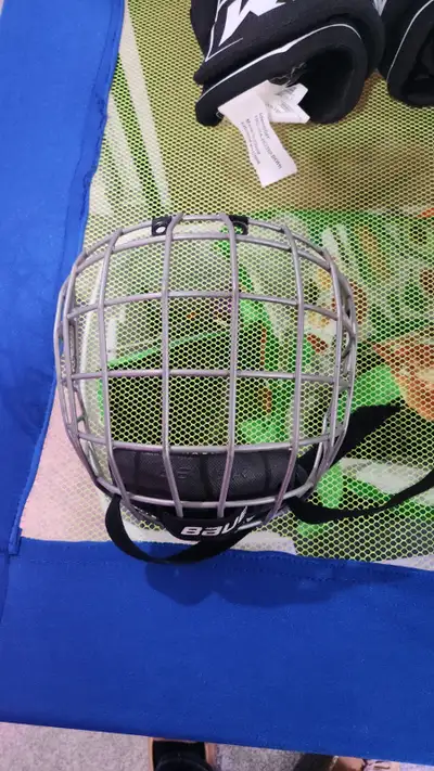 2 kid's hockey helmet cages. 1 Bauer S/M, 1 CCM Junior. Good shape, I have the clips and screws as w...