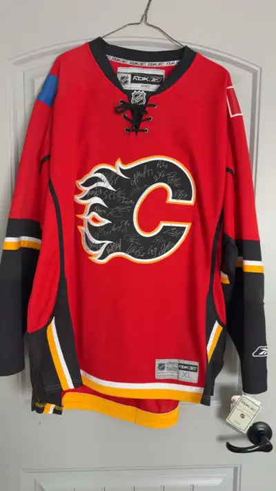 Signed Calgary flames jersey , View more