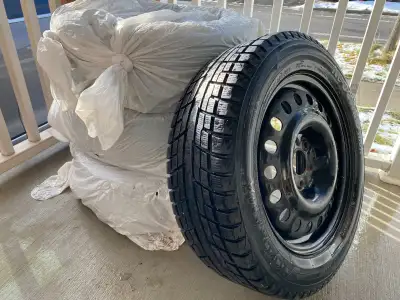 Selling a set of four nearly new YOKOHAMA Ice Guard 225/60R17 winter tires mounted on 17" steel rims...