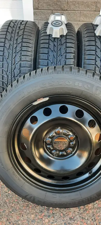 I have for sale a NEAR NEW set of 215/60/17 Firestone Winterforce 2UV winter tires. They are mounted...
