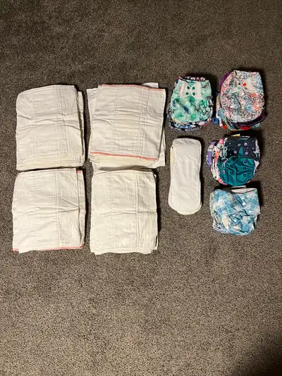 18-cloth diaper covers 41-Prefolds 13-pocket diapers 12-inserts All of different brands.