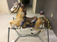 Old-fashioned children’s riding horse