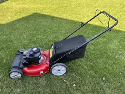 Save the land fill charges I will pick up your old gas powered lawnmower in Regina at no charge look...