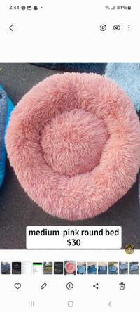 New pink round dog or cat bed