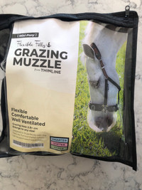 Pony grazing muzzles