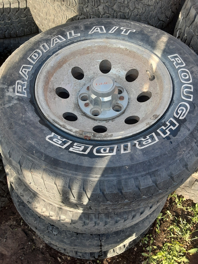 Chevy wheel + tires in Tires & Rims in Whitehorse