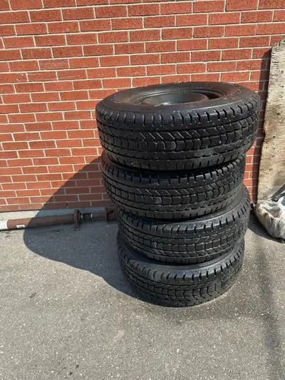 These are a set of four winter tires, size 265/70R17, mounted on steel rims, perfect for your 2022 F...