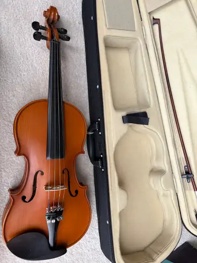Tuned and Works Good. The Violin Is Somewhere Between a 4/4 Size and a 3/4 Size: (22.5 inches long)....