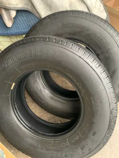 set of two all terrain tires for sale. Bridgestone V-Steel Rib - LT245/75R16 120R. They are off rim...