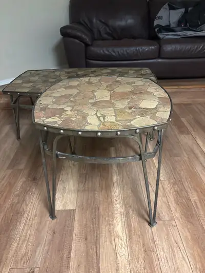 Heavy duty metal construction. Riveted edges make them look rustic. Very sturdy.