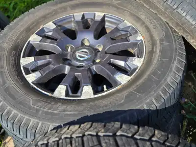 2018 Nissan titan xd aluminum wheels and tires,tires are a mix match but all same size and inspectab...