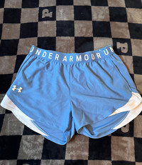 Women’s workout under armour light blue and white gym shorts 
