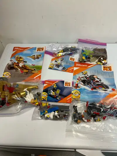 Despicable Me Lego sets as pictured. Some missing pieces.