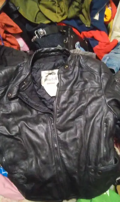 Great condition leather coat selling for $300 retail price is $750 look for someone to use it well