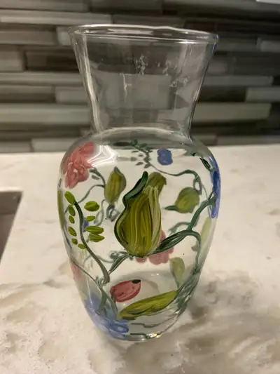 Pretty and unique small glass vase, View more
