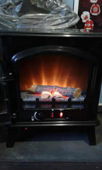 Used Slyvania 1500 w Electric Stove Fireplace