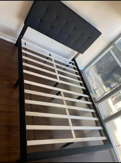 Moving sale!!! Sturdy queen-sized bed frame with headboard and box spring for sale. A discount will...