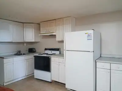 FOR RENT: FULLY RENOVATED BASEMENT CENTRALY HEATED AND AC