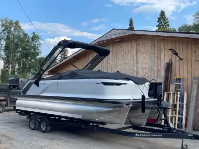 I am selling a nearly new Manitou pontoon boat, a luxurious and versatile vessel perfect for cruisin...