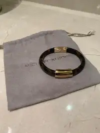 Authentic Michael Kors bangle bracelet and pouch