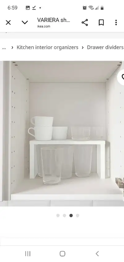 Brand New, unopened Ikea Variera Shelf. Great space saver for your cabinets! Cups not included.