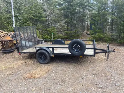 2022 utility trailer. Less then 1000 km on trailer. Loading ramp, spare tire and front jack. 6’ X 12...
