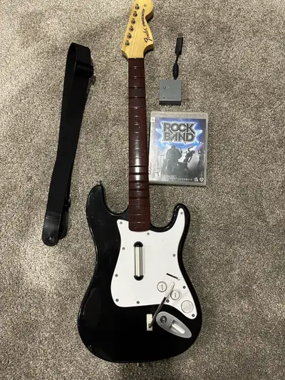 PlayStation 3 wireless rock band guitar with dongle and game tested and working properly $140 firm n...