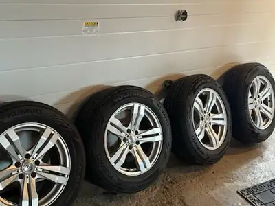 Got a set of tires mounted on rims looking to sell. Tires are a 215/65R17 kumho with 5000km on them....
