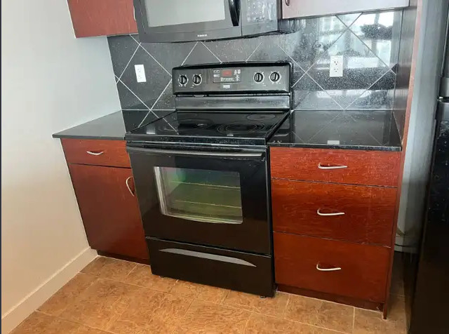 Cabinets and Kitchen Island (1 Left) in Multi-item in Calgary - Image 2
