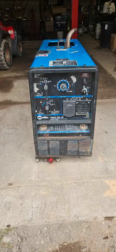 Miller Bobcat 225 8500 watt welder generator 803 hours onan engine come with leads. Hardly used was...