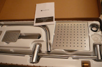 new still in the box, handheld shower and showerhead