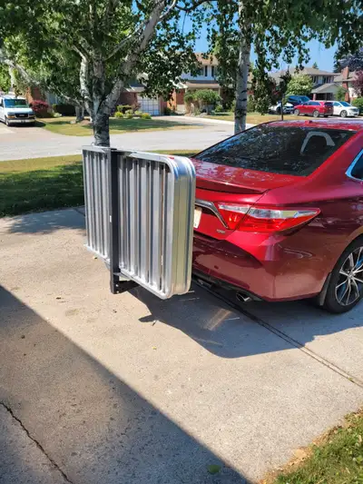 This Deluxe Cargo Carrier with Loading Ramp is perfect for hauling mobility scooters, mowers, power...