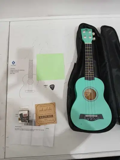 Discover the joy of music with this new condition 21" Soprano Ukulele! Perfect for kids, students, a...