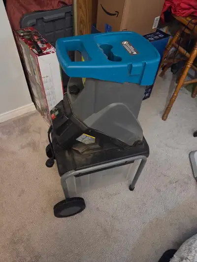 features a 15-amp electric motor that can shred twigs, branches, and foliage up to roughly 1.5 inche...