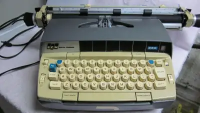 lovely, clean and working portable electric typewriter. Smith Corona 250, MCM from 60's. Comes with...