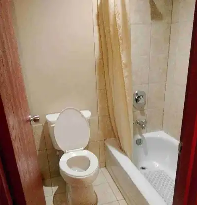 I bed, in a 1 room hotel room, in Airdrie, Alberta, fridge, cooking ability, microwave,cable t. v, d...